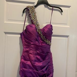 Beautiful purple one shoulder gown with crystals